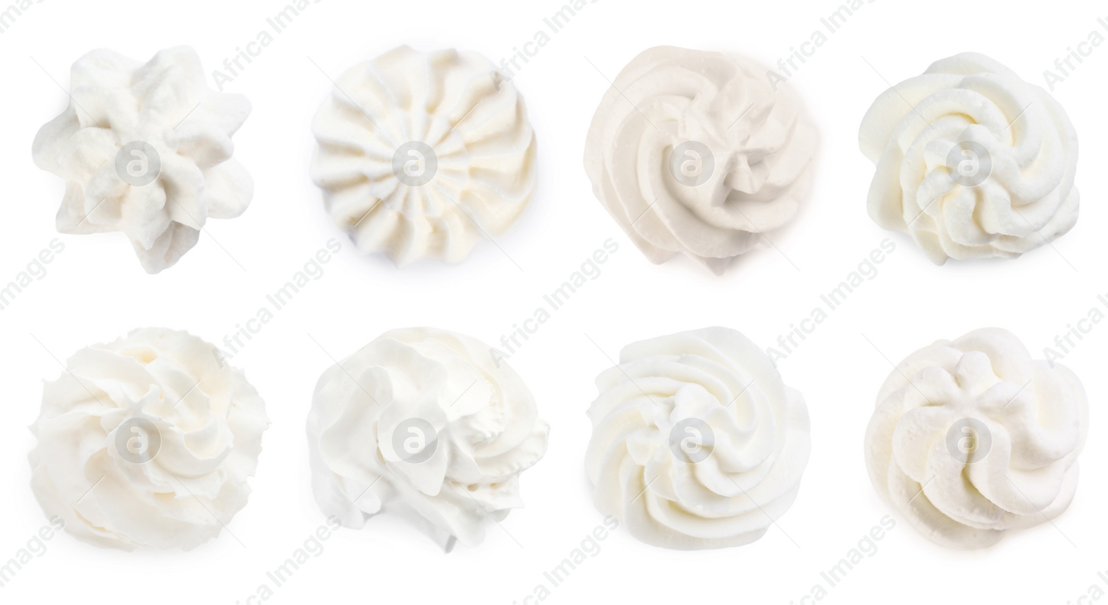 Image of Set with delicious fresh whipped cream on white background, top view