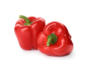 Photo of Raw ripe paprika peppers on white background