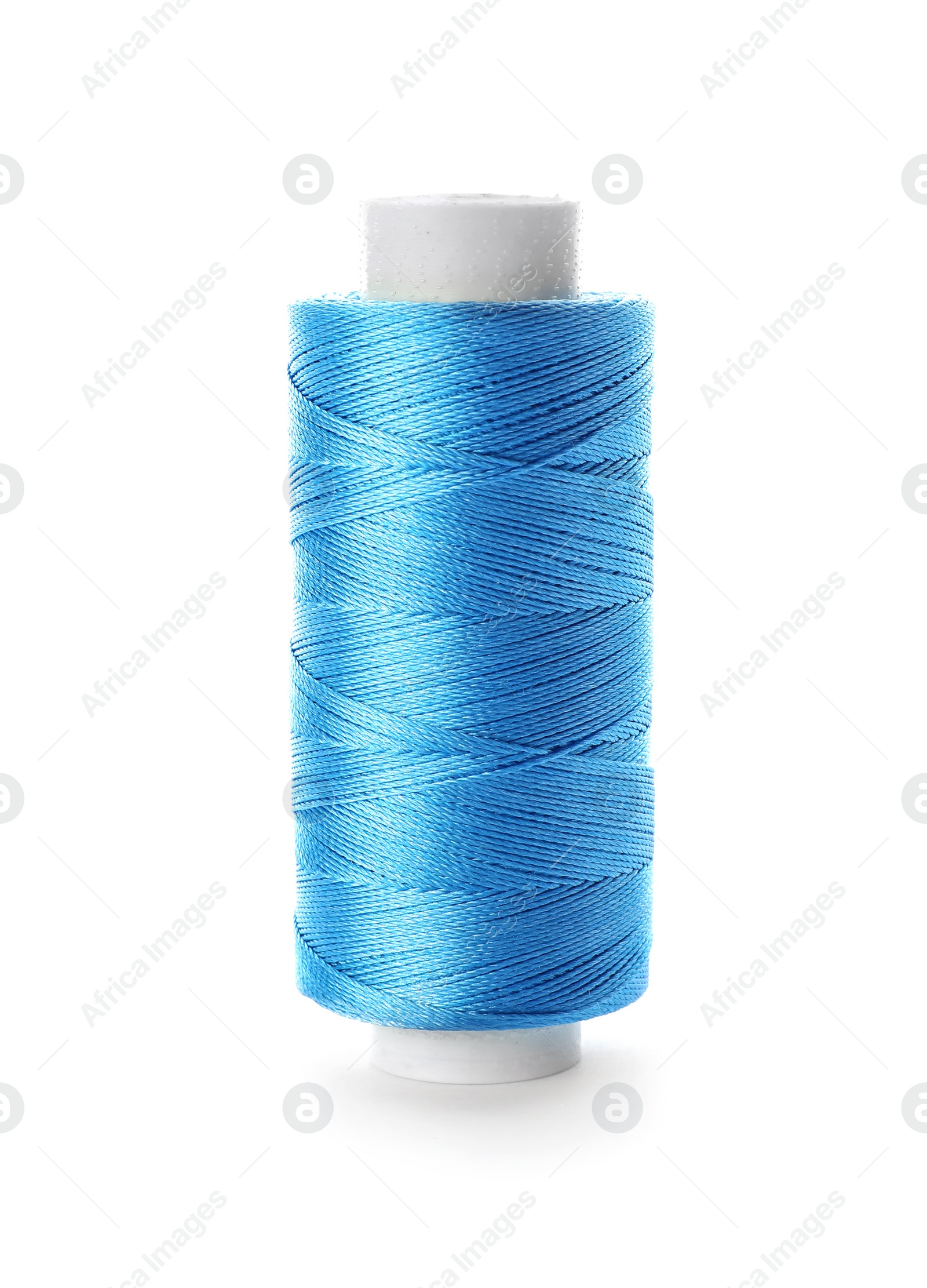 Photo of Color sewing thread on white background