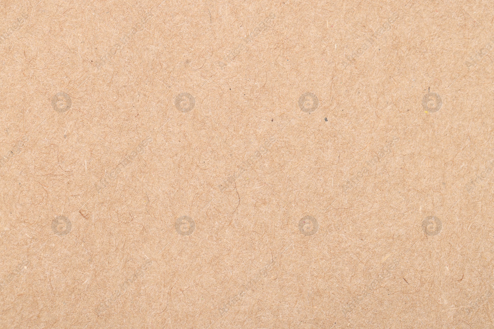 Photo of Texture of beige paper sheet as background, top view