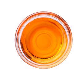 Photo of Glass bowl with orange food coloring isolated on white, top view