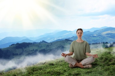 Image of Woman meditating in foggy mountains at sunrise
