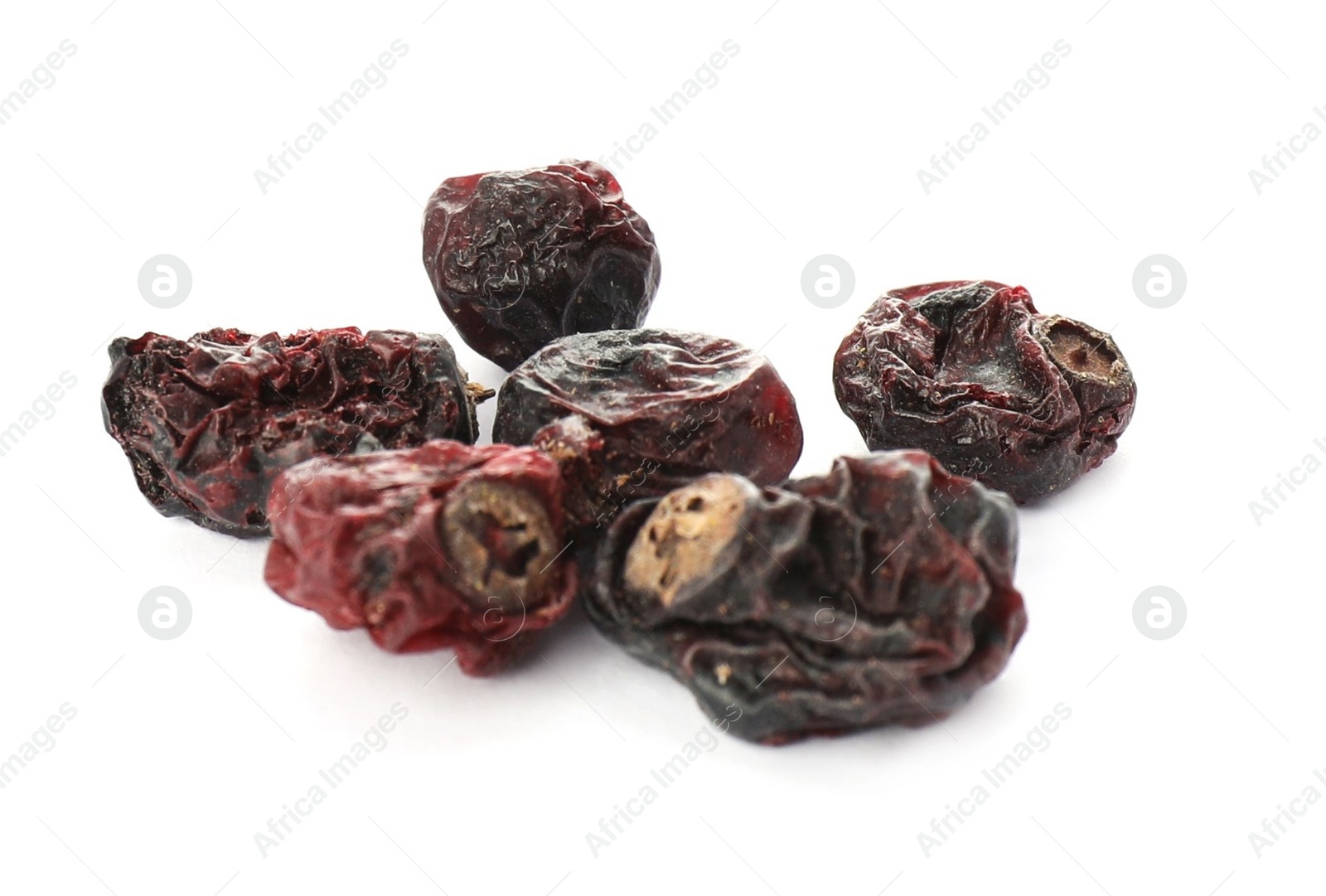Photo of Heap of tasty dried currants on white background
