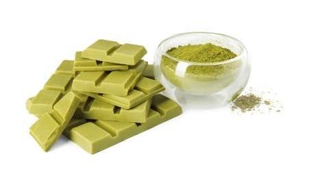 Photo of Pieces of tasty matcha chocolate bar and powder isolated on white