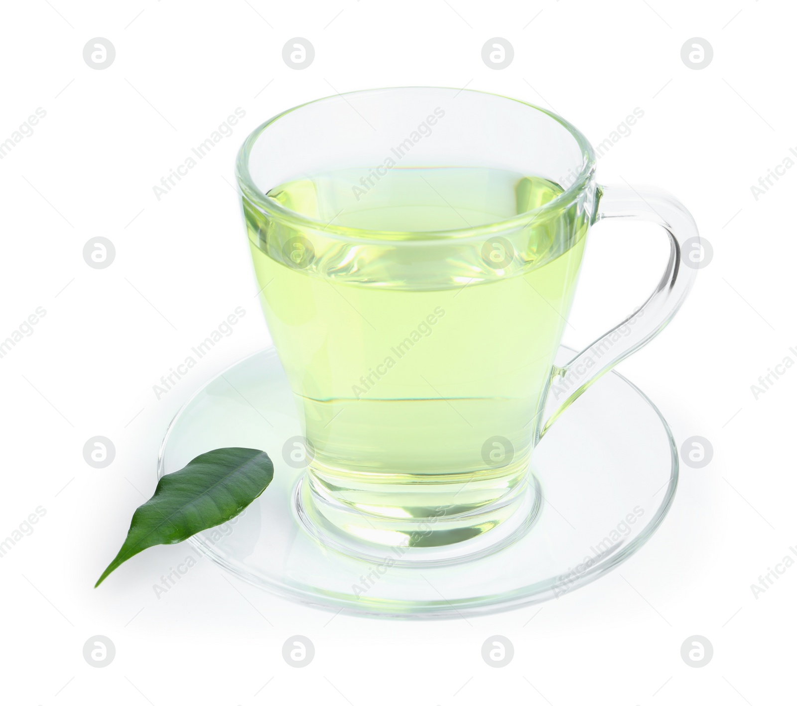 Photo of Cup of aromatic green tea and leaf isolated on white