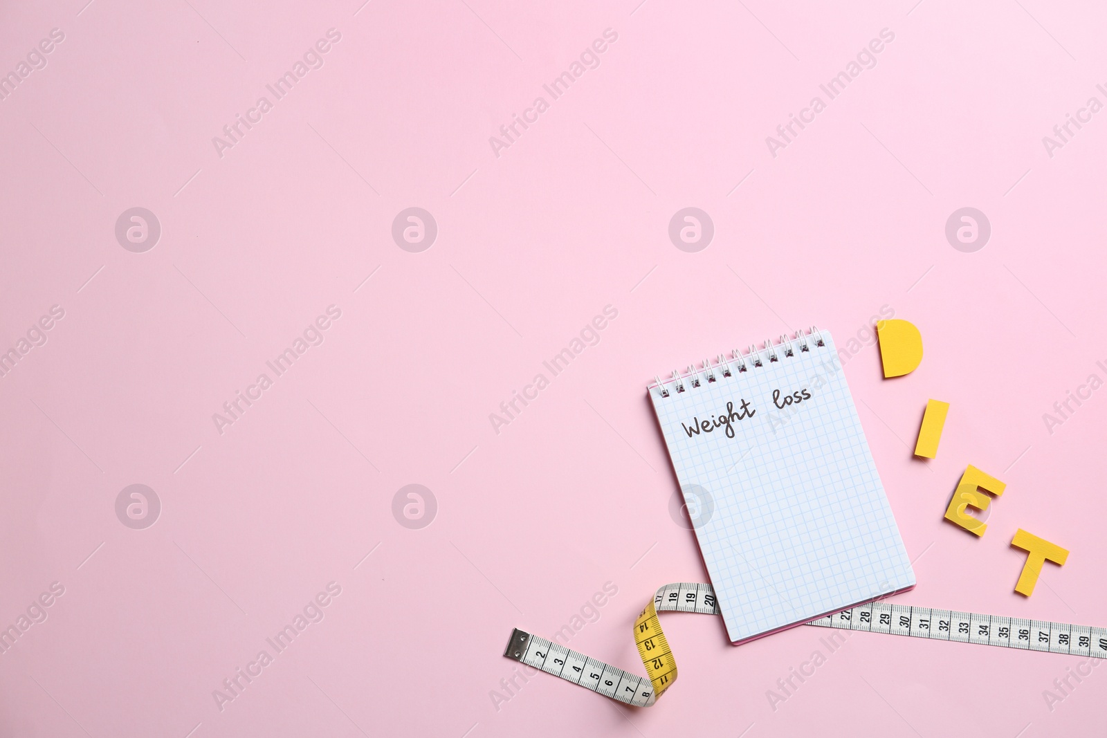 Photo of Flat lay composition with word "DIET" and space for text on color background. Concept of weight loss