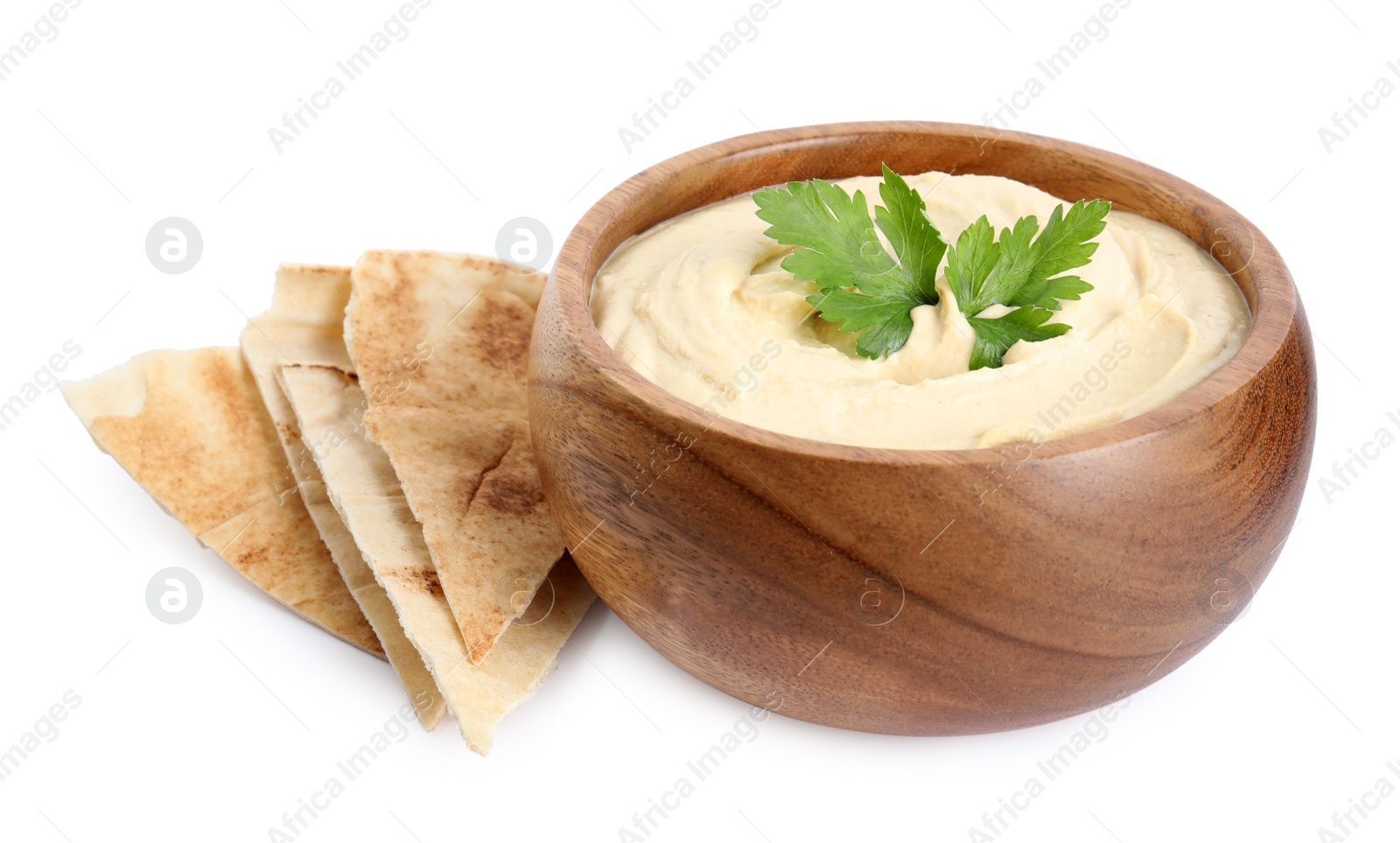 Photo of Delicious hummus with pita chips and parsley on white background