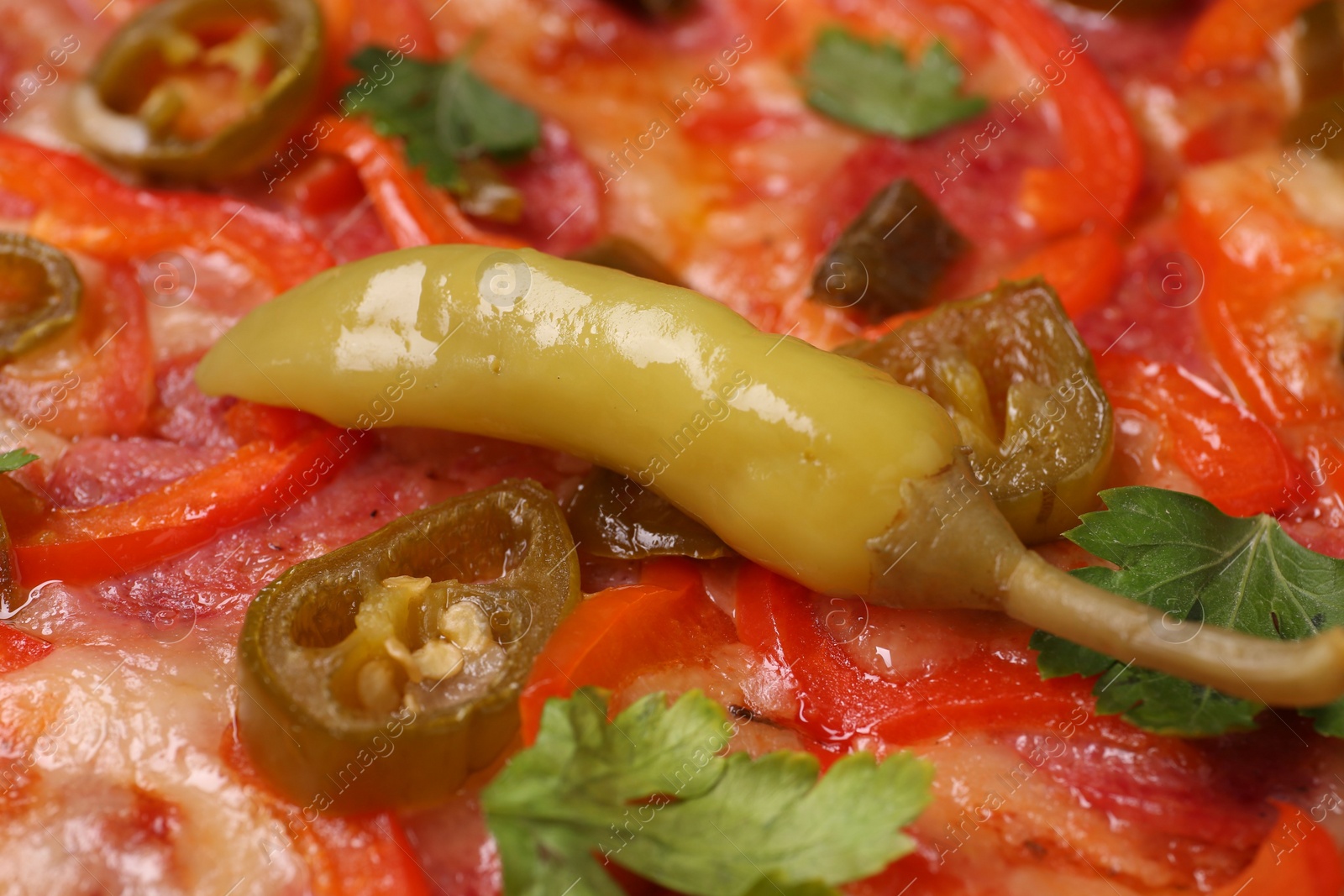 Photo of Delicious hot pizza Diablo as background, closeup