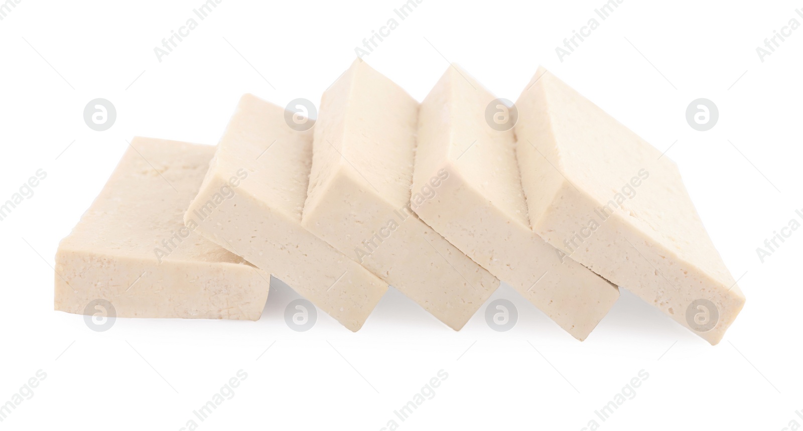 Photo of Slices of delicious raw tofu on white background