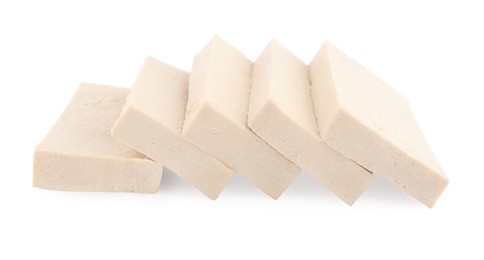 Photo of Slices of delicious raw tofu on white background