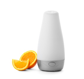 Automatic air freshener and orange on white background