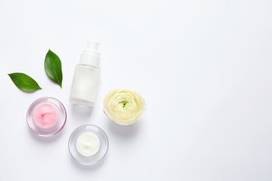 Photo of Cosmetic products on white background, flat lay