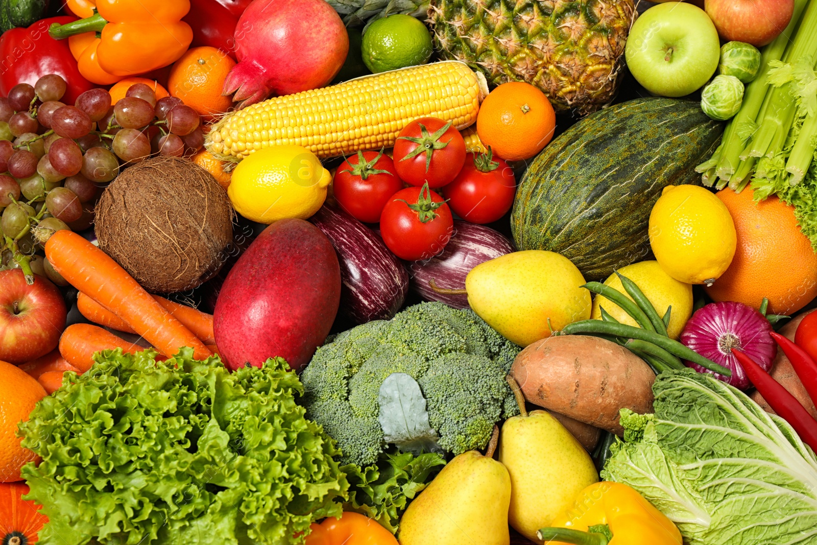 Photo of Assortment of organic fresh fruits and vegetables as background, closeup