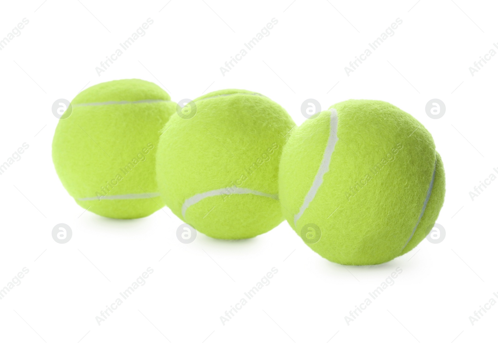 Photo of Tennis balls isolated on white. Sports equipment