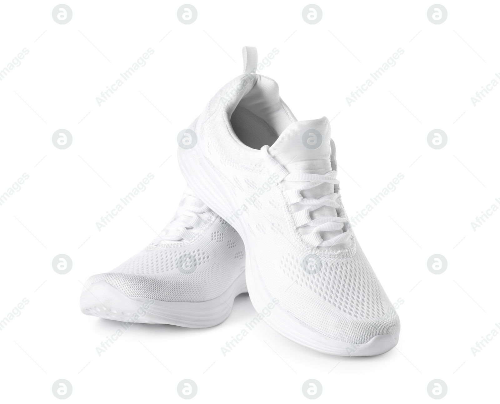 Photo of Stylish sport shoes on white background. Trendy footwear