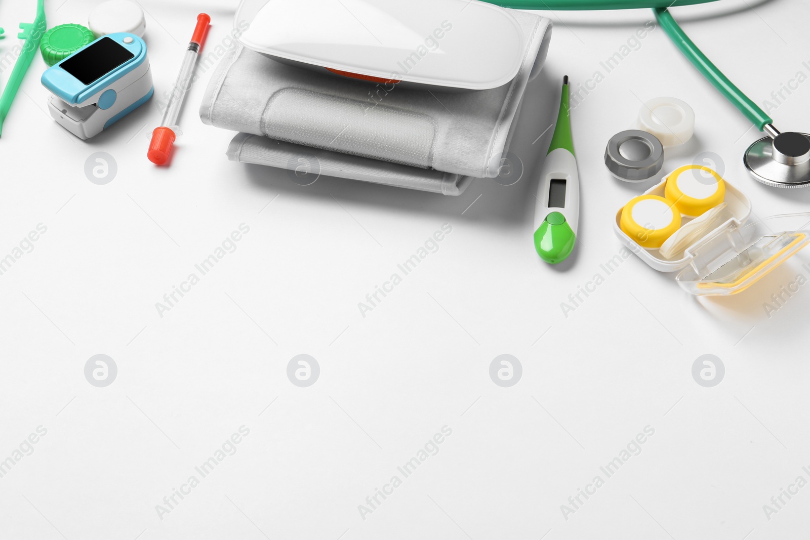 Photo of Different medical objects on white background. Space for text