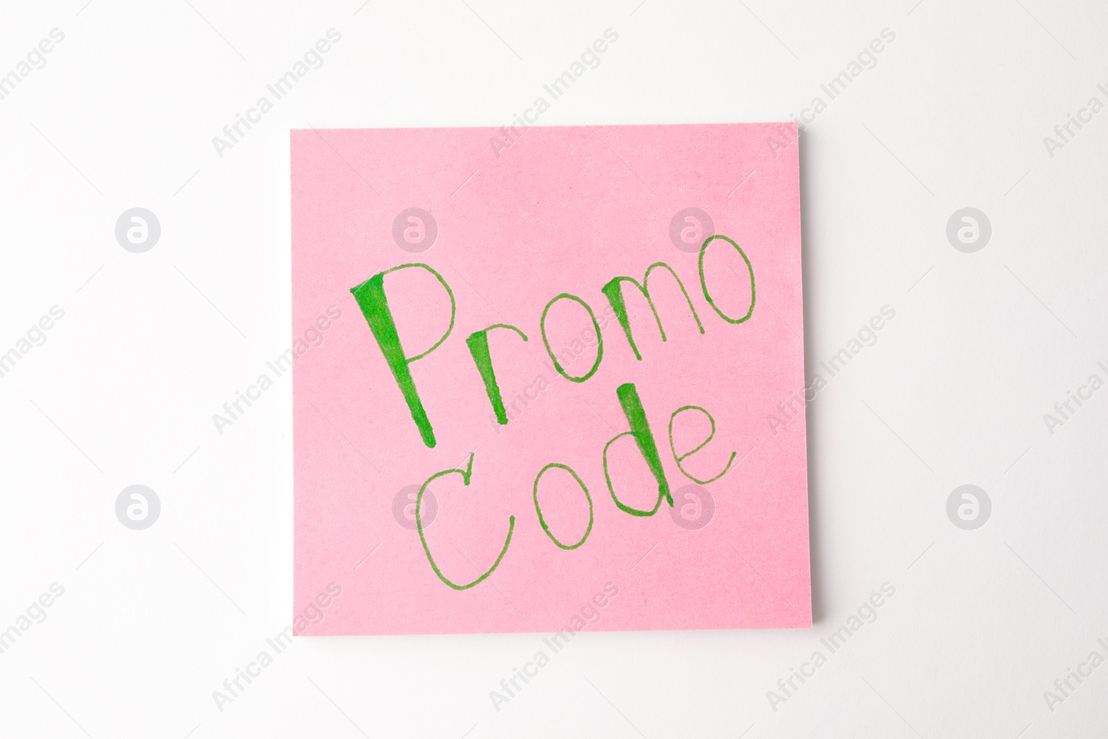 Photo of Note with words Promo Code on white background, top view