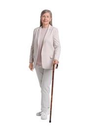 Senior woman with walking cane on white background