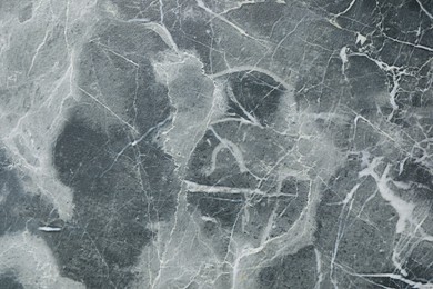 Texture of grey marble stone surface as background, closeup