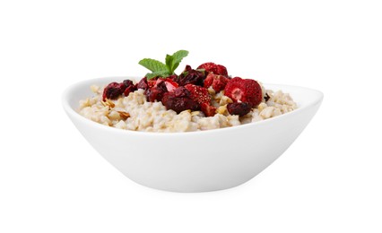 Photo of Oatmeal with freeze dried strawberries and mint isolated on white