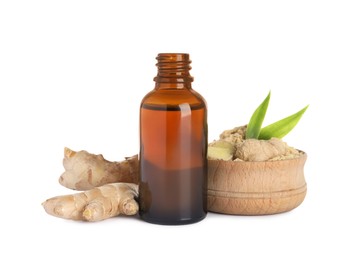 Glass bottle of essential oil and ginger root on white background
