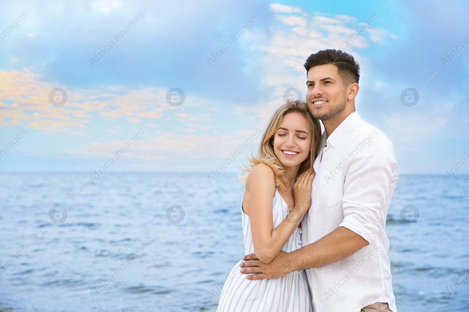 Photo of Happy couple on beach, space for text. Romantic walk