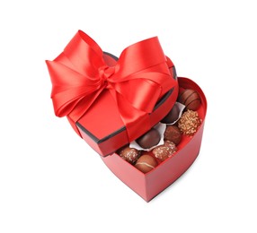Heart shaped box with delicious chocolate candies isolated on white