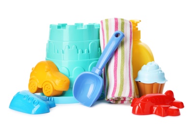 Photo of Set of plastic beach toys on white background
