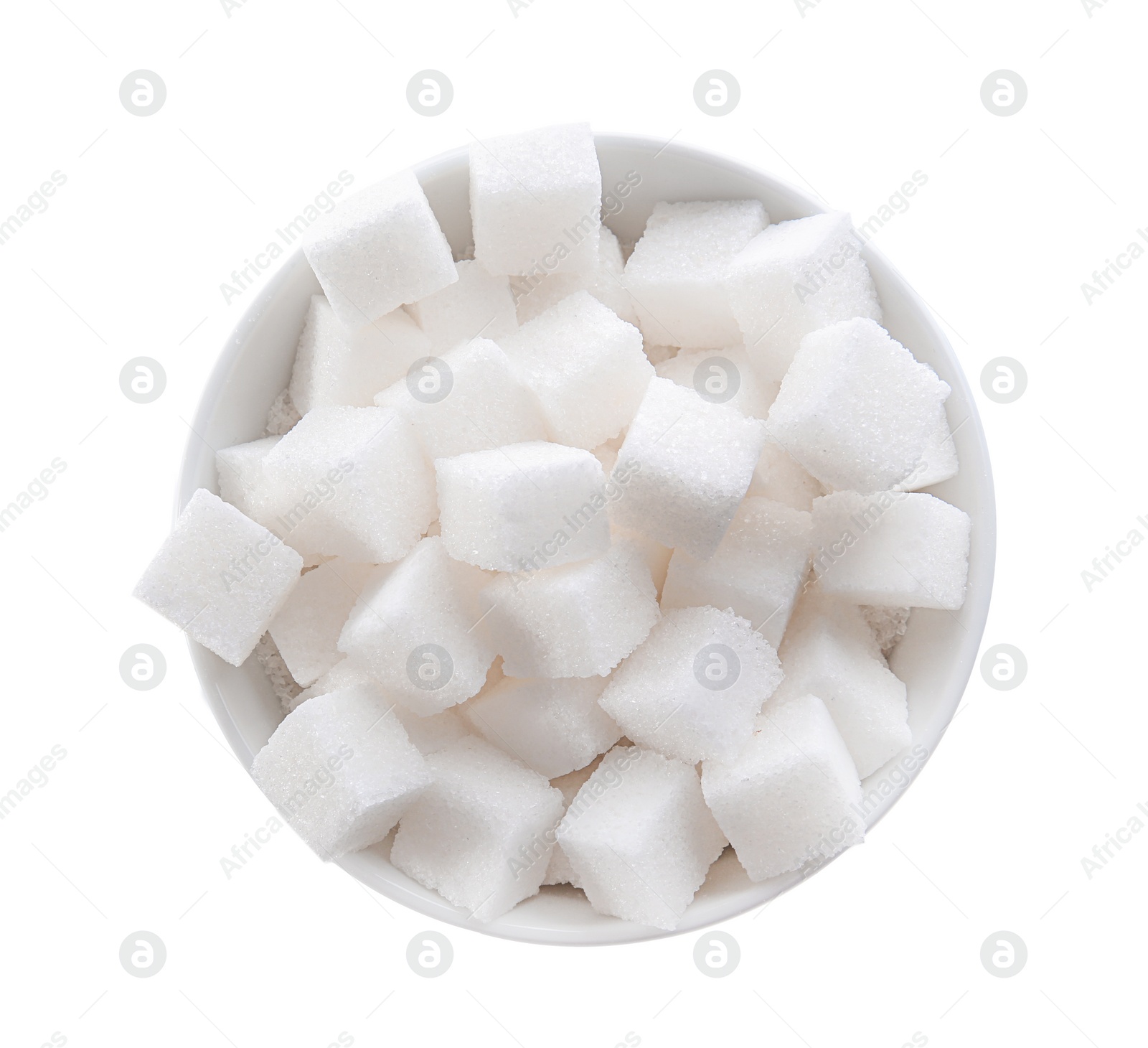 Photo of Refined sugar cubes in bowl on white background, top view