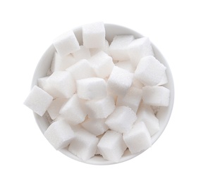 Refined sugar cubes in bowl on white background, top view