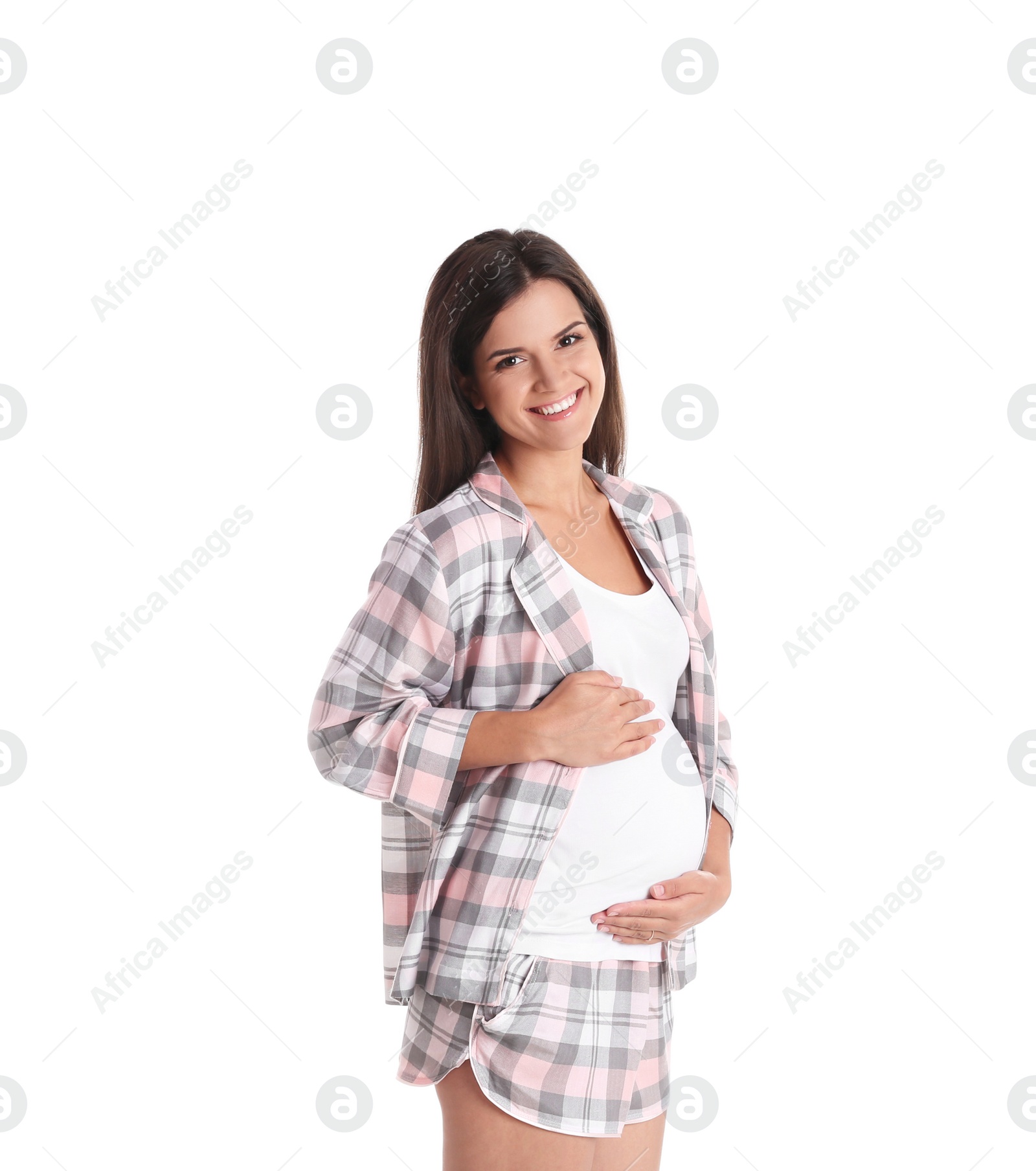 Photo of Happy pregnant woman posing on white background