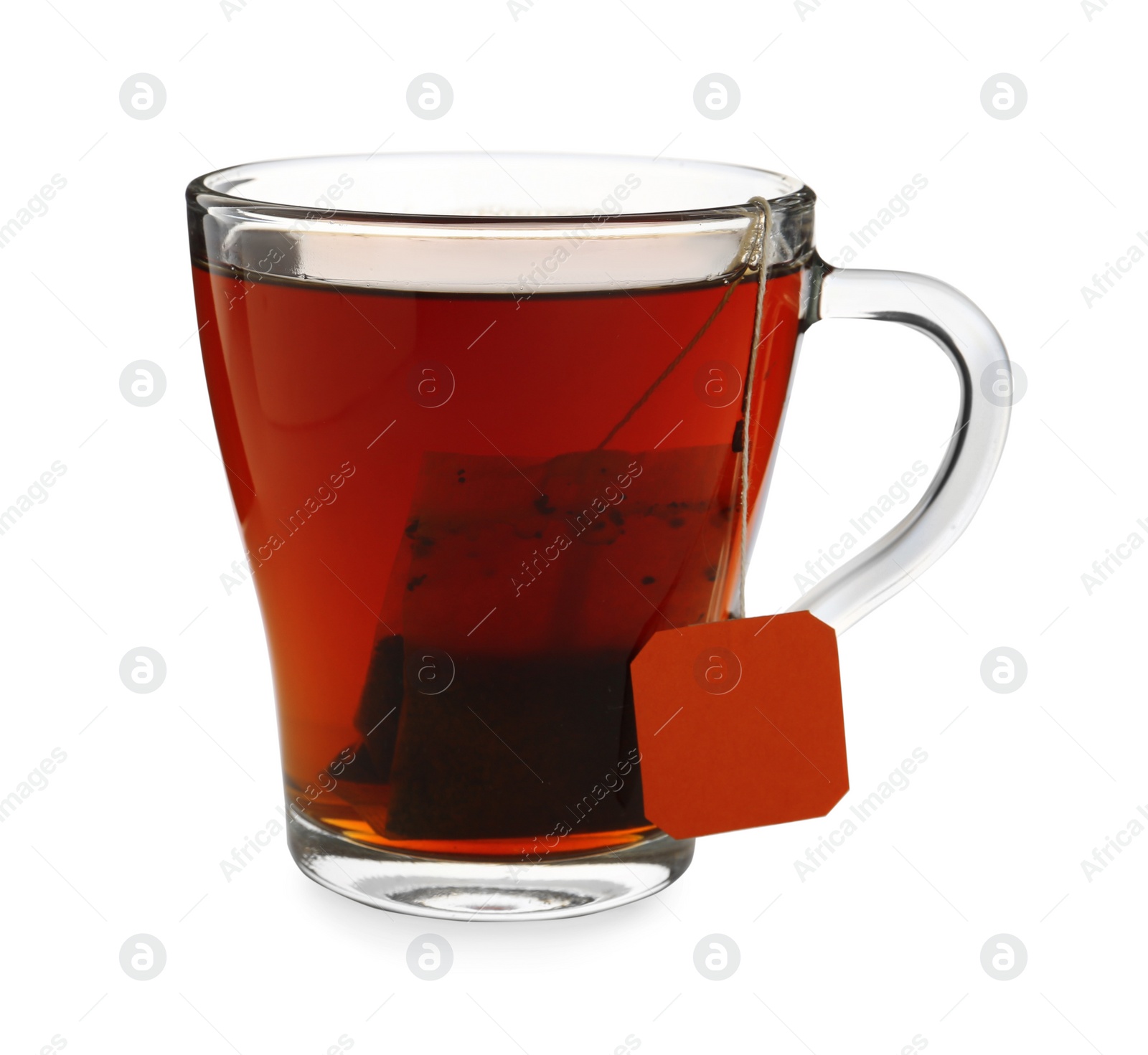 Photo of Tea bag in glass cup of hot water isolated on white