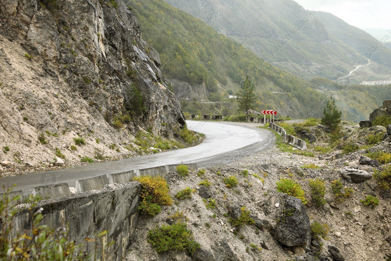 Photo of Picturesque view of empty road near mountains