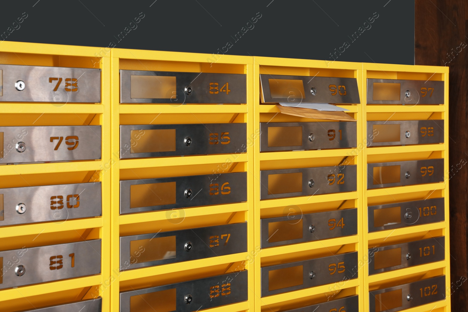 Photo of Metal mailboxes with correspondence in post office