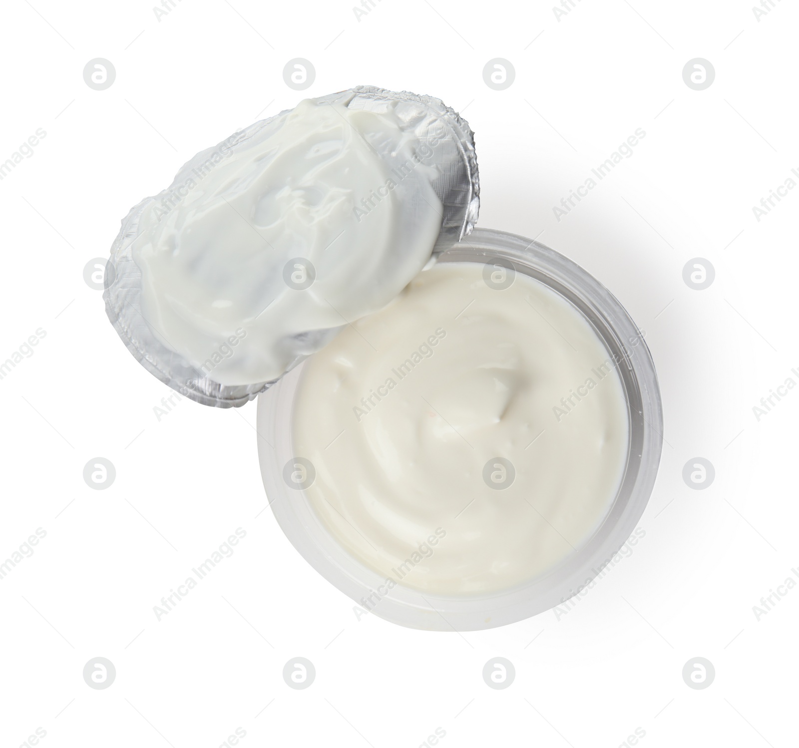 Photo of Plastic cup with creamy yogurt on white background, top view