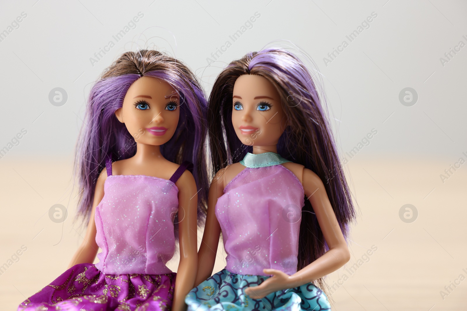 Photo of Leiden, Netherlands - September 20, 2023: Beautiful Barbie dolls on light blurred background