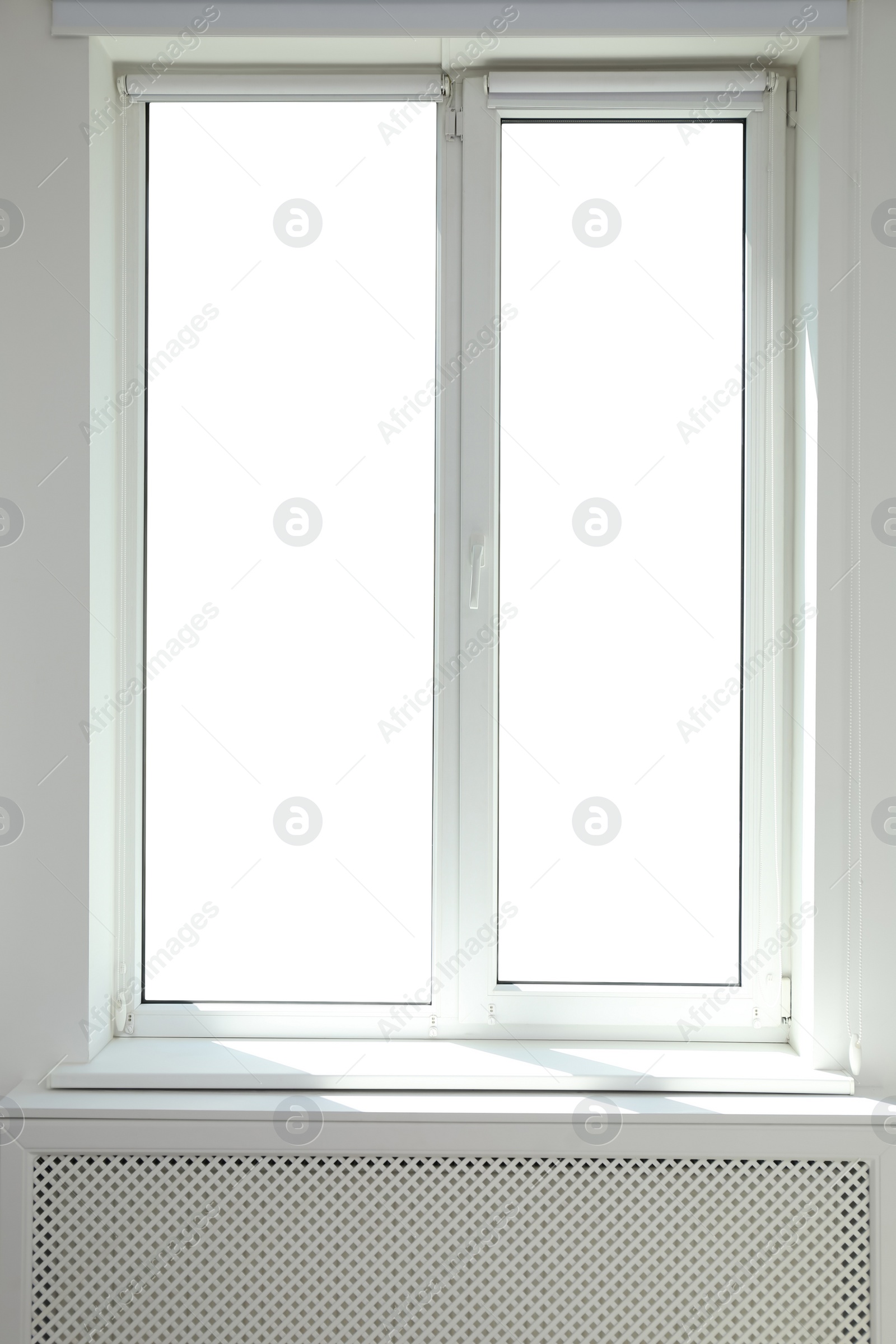 Photo of Window with empty white sill in room