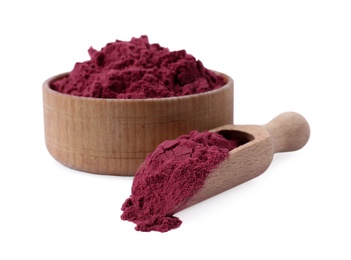 Wooden scoop and bowl of acai powder on white background