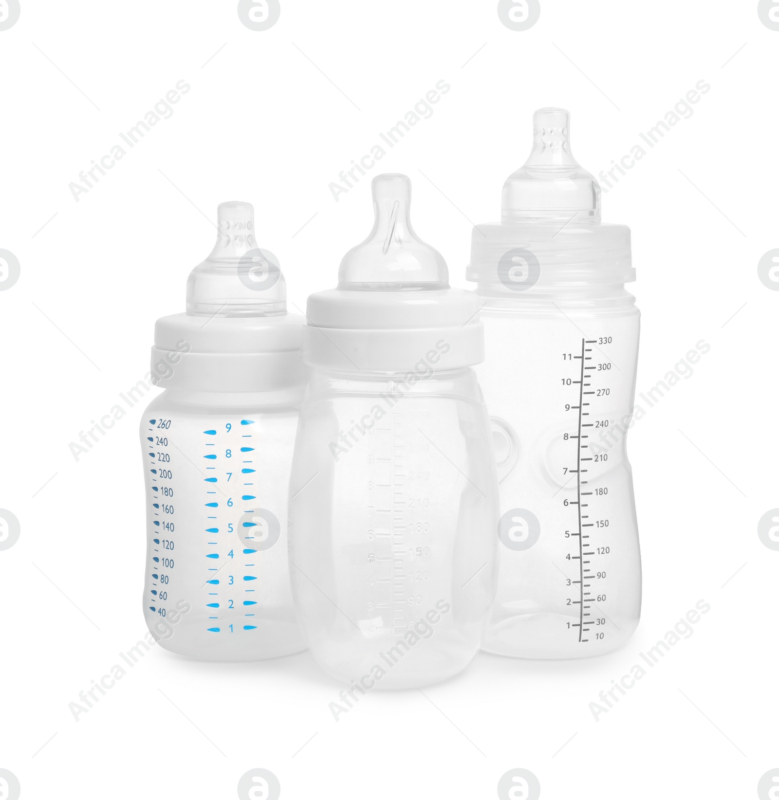 Photo of Three empty feeding bottles for baby milk on white background