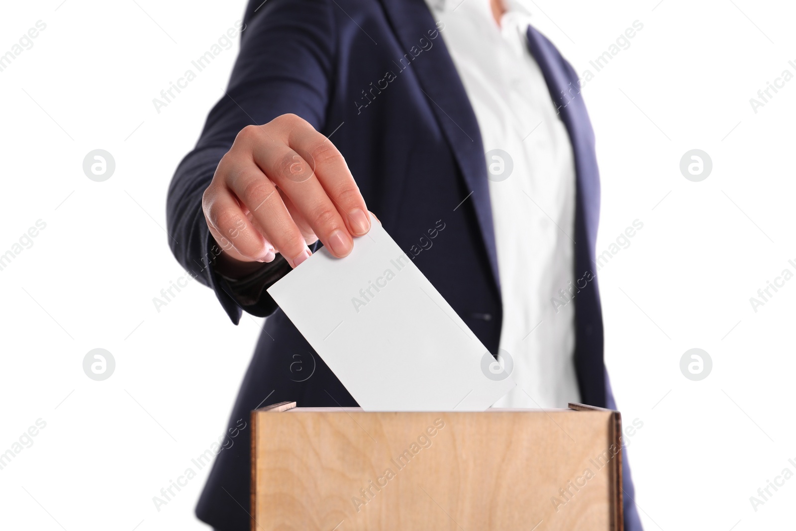 Photo of Woman putting her vote into ballot box on white background, closeup