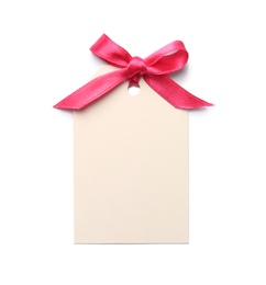 Photo of Blank gift tag with satin ribbon on white background, top view