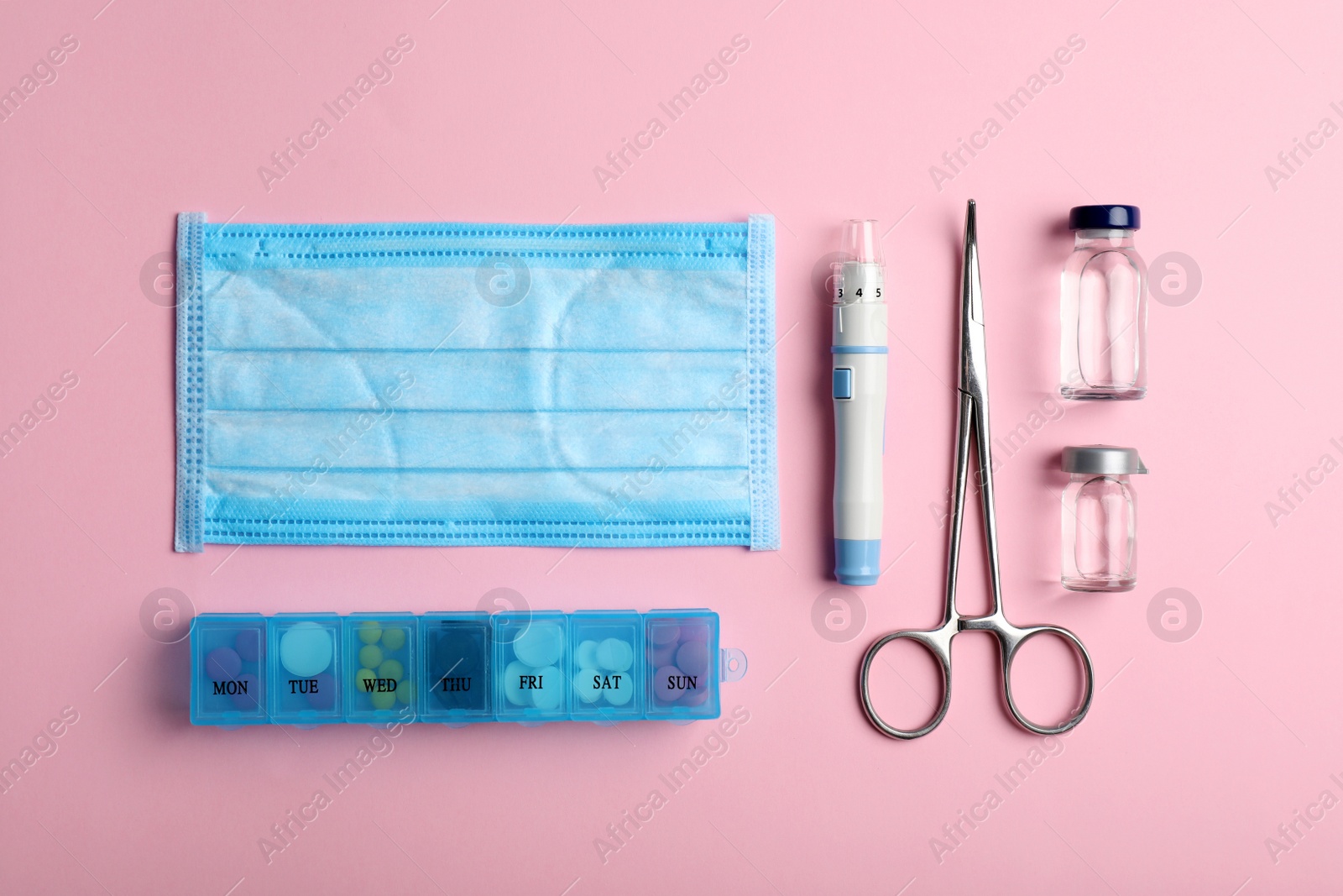 Photo of Flat lay composition with medical objects on color background