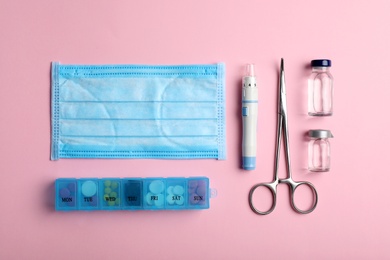 Photo of Flat lay composition with medical objects on color background