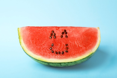 Photo of Watermelon with funny smiling face on color background