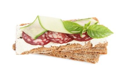 Fresh rye crispbreads with salami, cream cheese and cucumber on white background