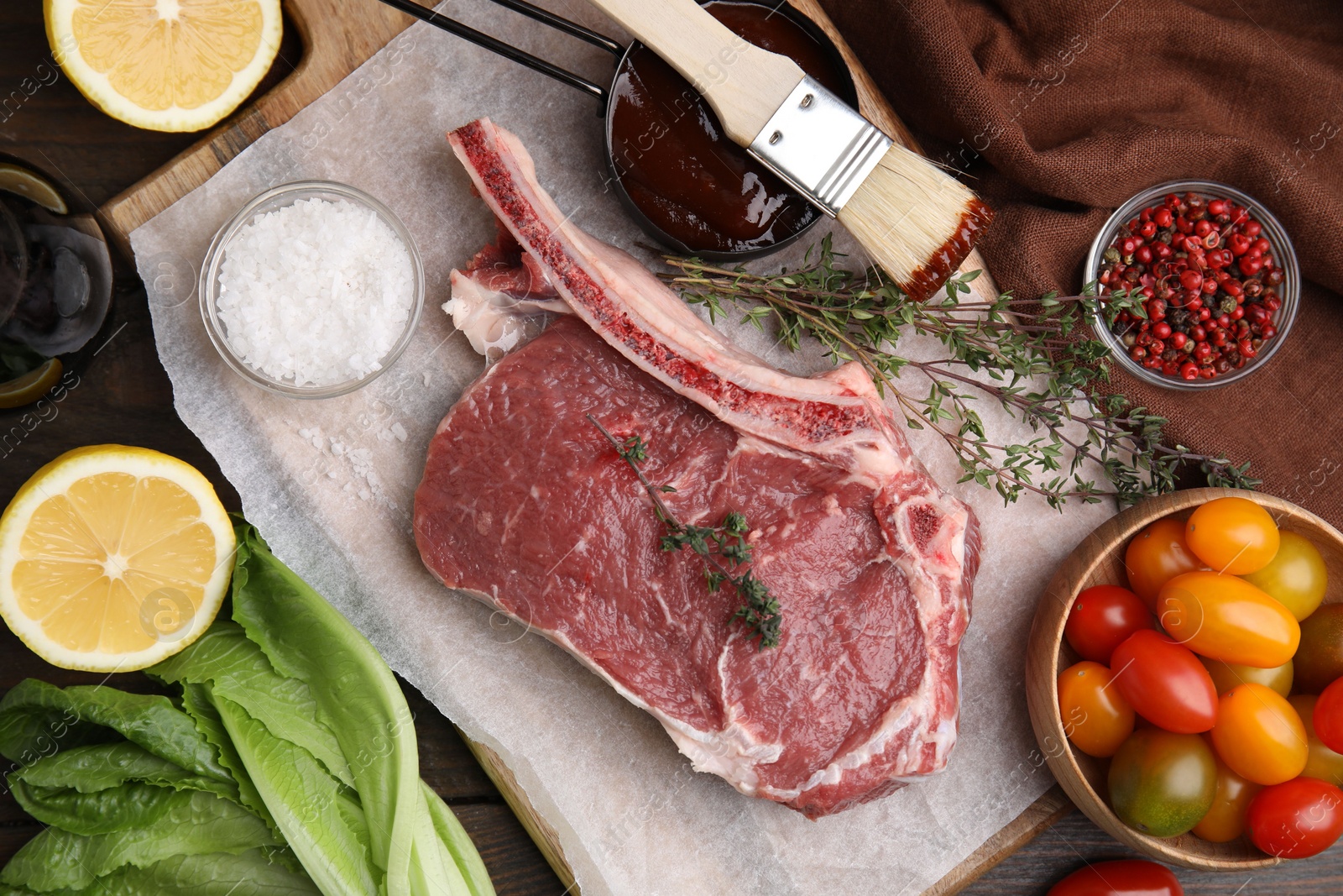 Photo of Flat lay composition with raw meat, thyme and marinade on table