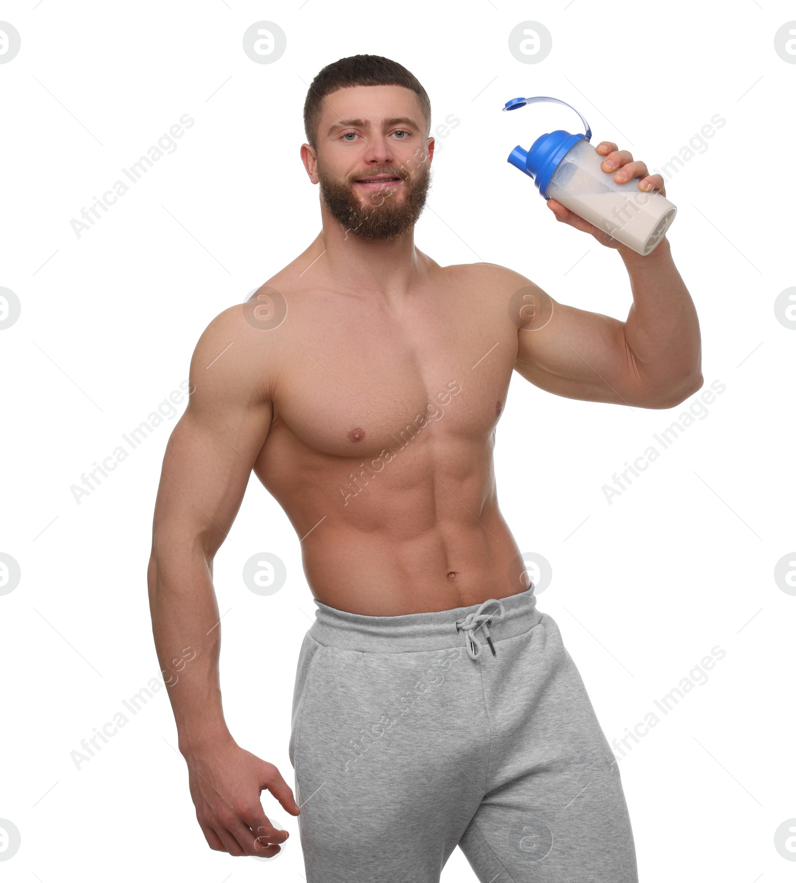 Photo of Young man with muscular body holding shaker of protein on white background