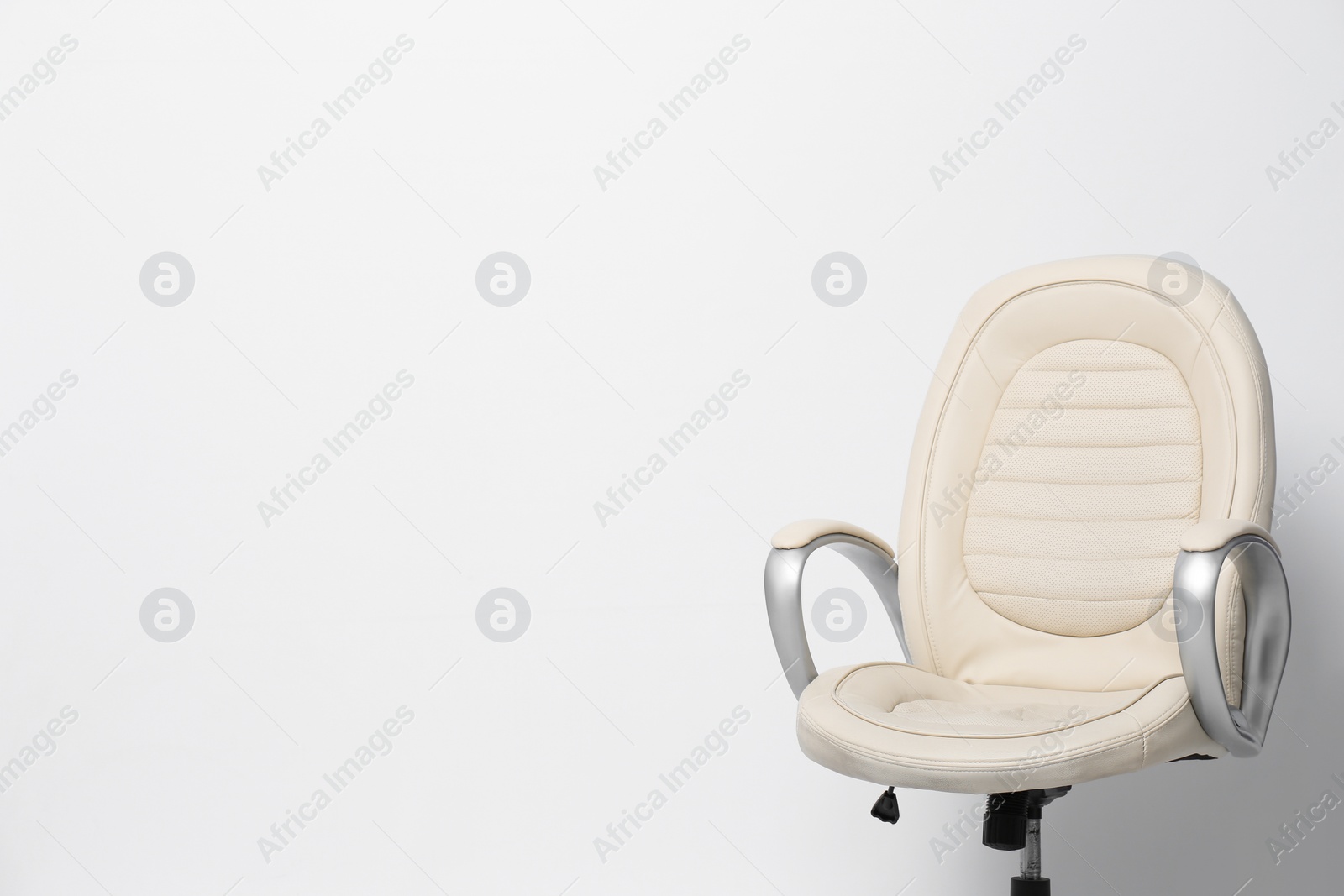 Photo of Comfortable office chair on white background, space for text