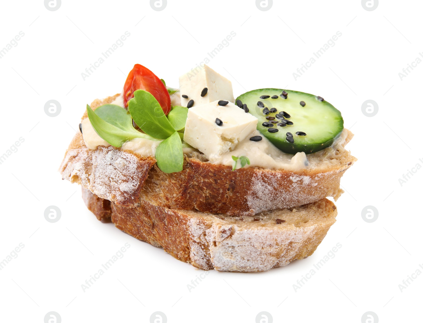 Photo of Tasty vegan sandwich with tofu, cucumber, tomato and sesame seeds isolated on white