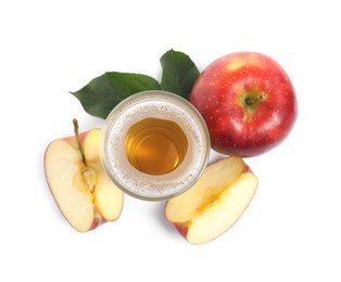 Photo of Delicious cider in glass near ripe apples on white background, top view